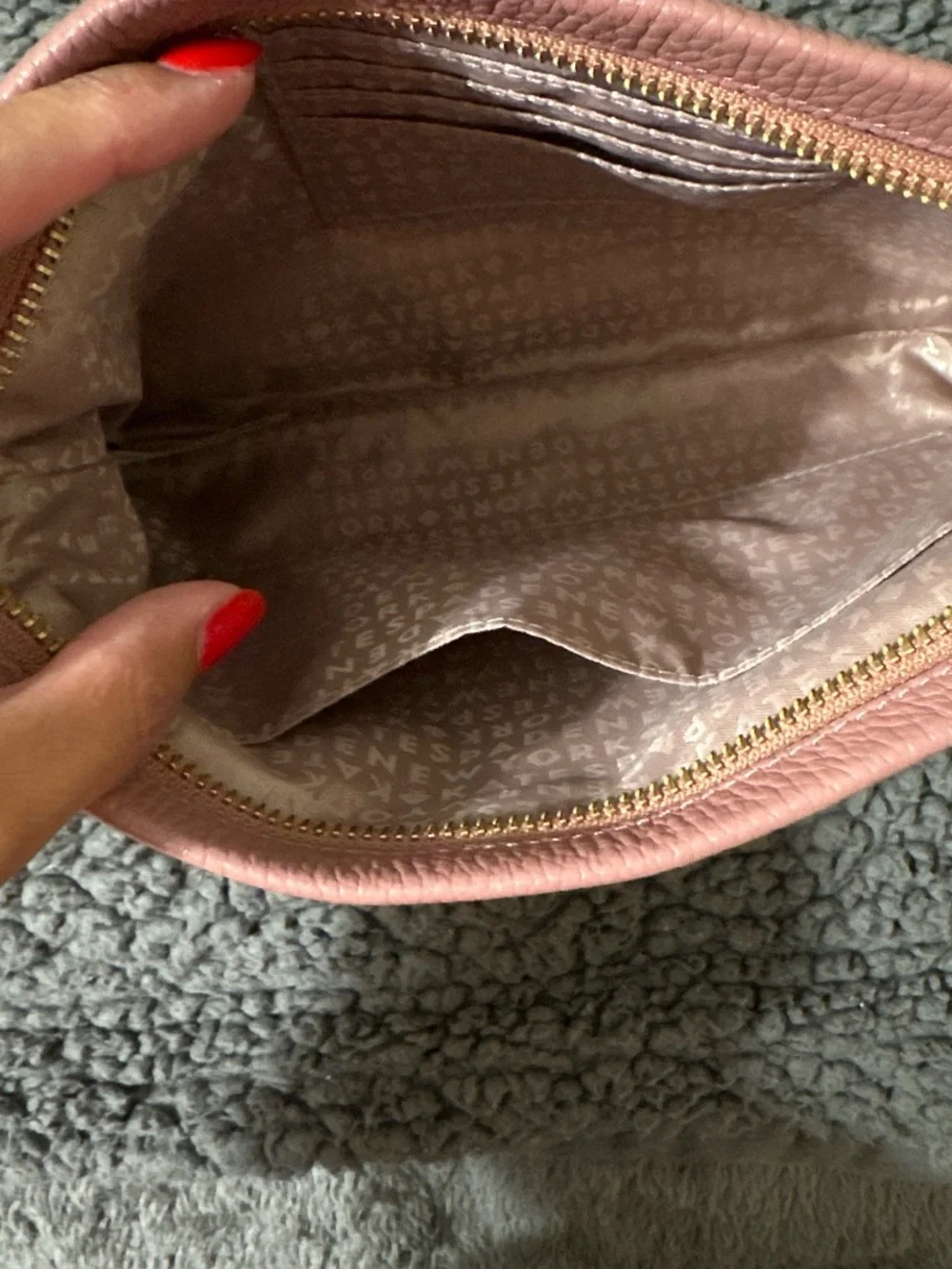 kate spade Dusty Rose Pebbled Leather Tassel Zip Clutch